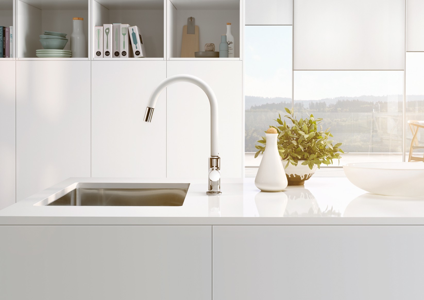 Zdjęcie obrazuje użycie armatury kuchennej BINGO STAR XS w aranżacji białej kuchni 